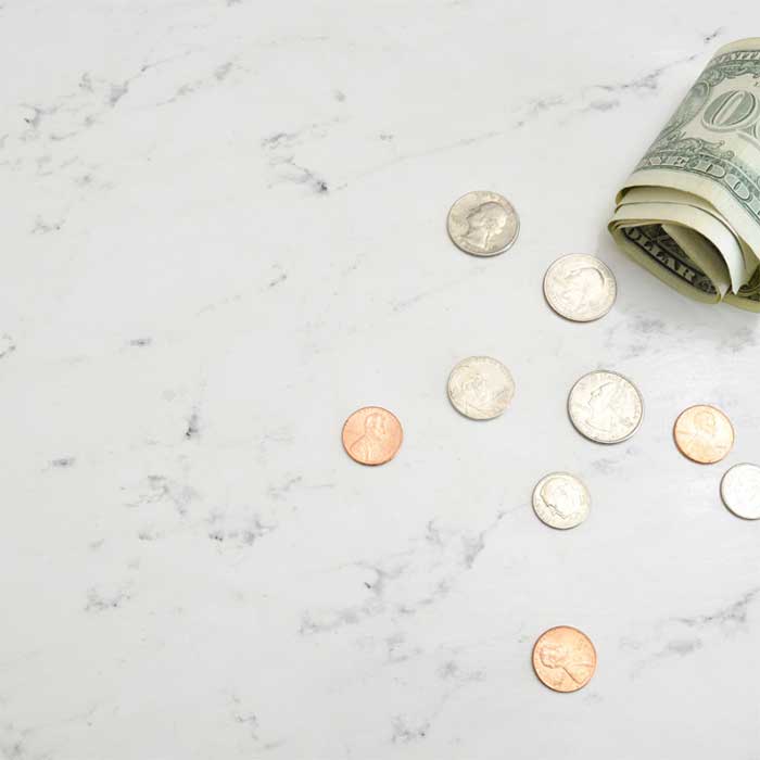 Coins and notes on the floor depicting loan options in the DFW Metroplex
