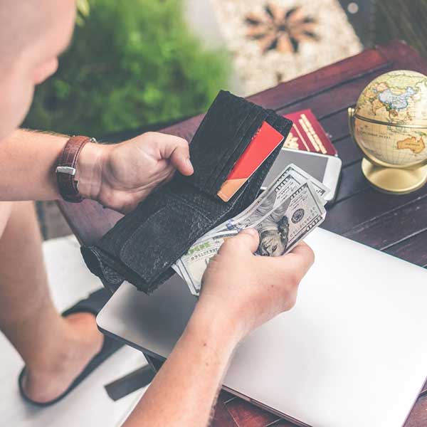 Man holding money wallet