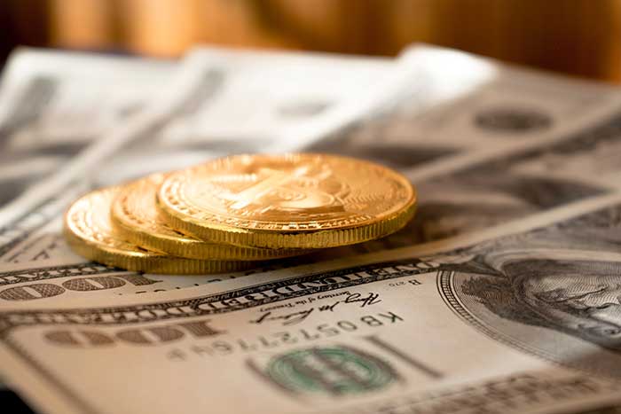 Gold coins and dollars