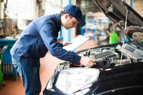 Mechanic at work in his garage in Texas