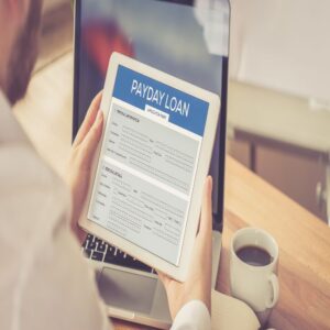 A man filling an online payday loan form of VIP Title Loans in the DFW Metroplex
